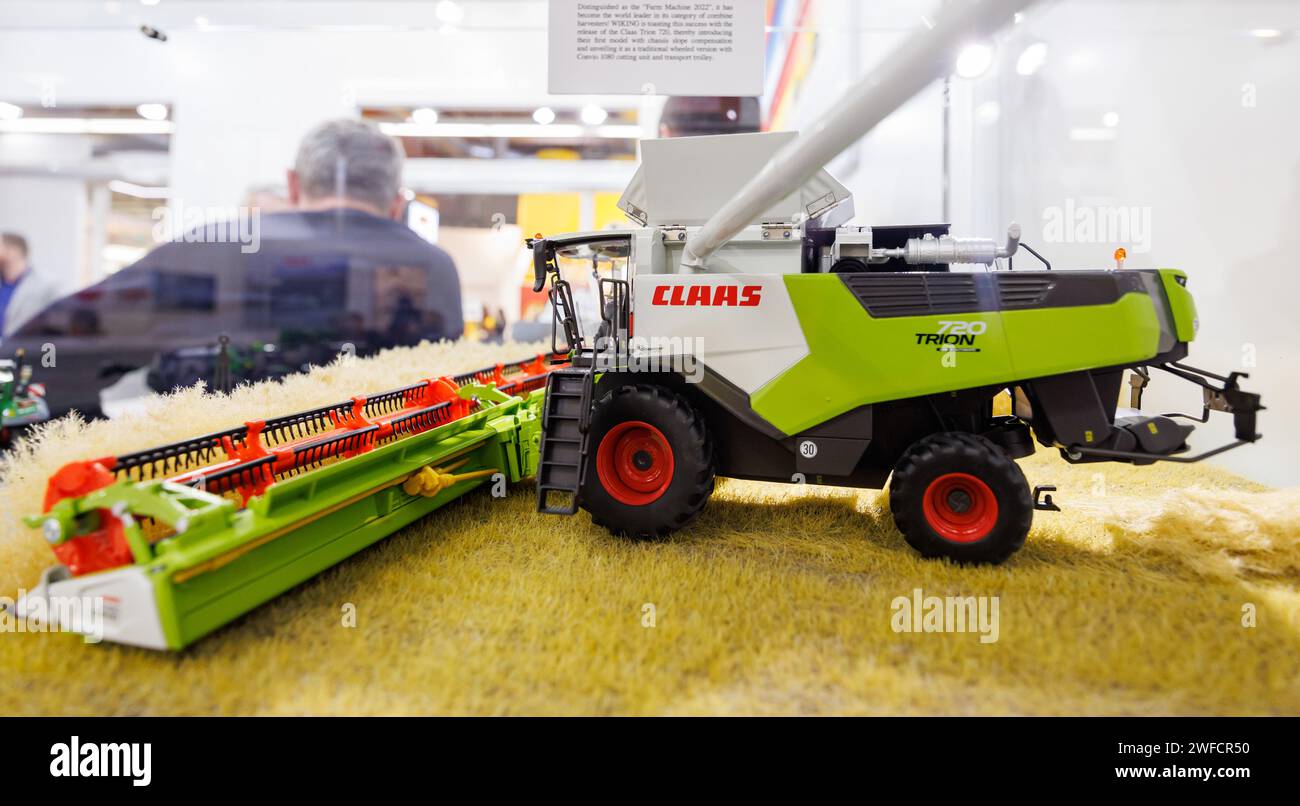 Nuremberg, Germany. 30th Jan, 2024. A combine harvester model based on the Claas Trion 720 Montana will be on display during the 73rd International Toy Fair. From January 30 to February 3, 2024, the toy industry will meet in Nuremberg at the International Toy Fair. This year, the trade fair has proclaimed playing adults as the trend theme. Credit: Daniel Karmann/dpa/Alamy Live News Stock Photo