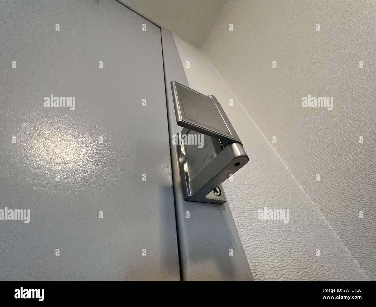 Hotel deadbolt lock on room door, Austin, Texas, March 11, 2023 Stock