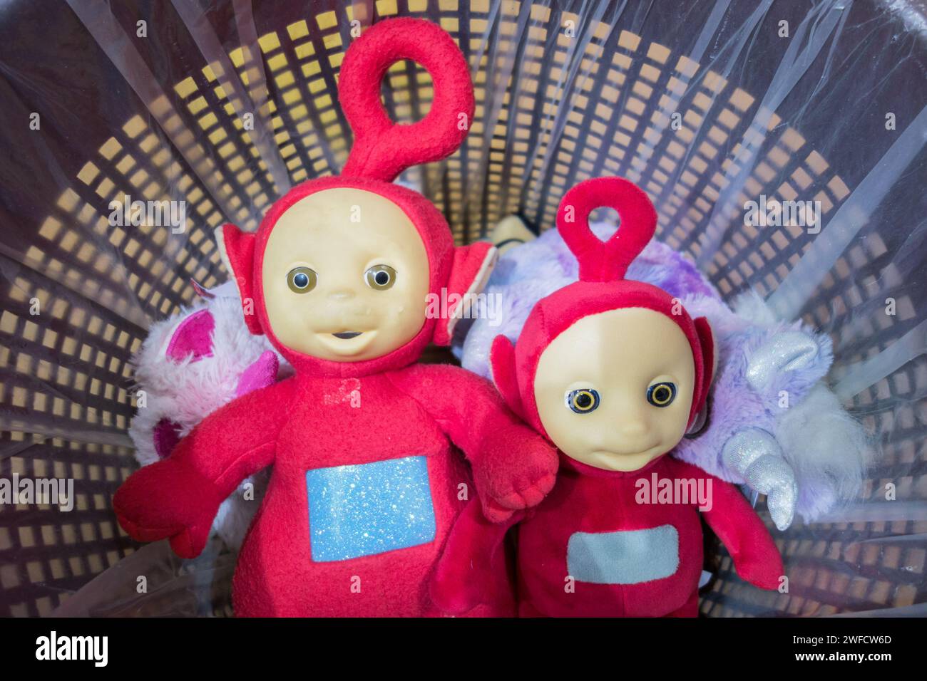 Close up of Po the red Teletubby with circle-shaped antenna in a basket Stock Photo