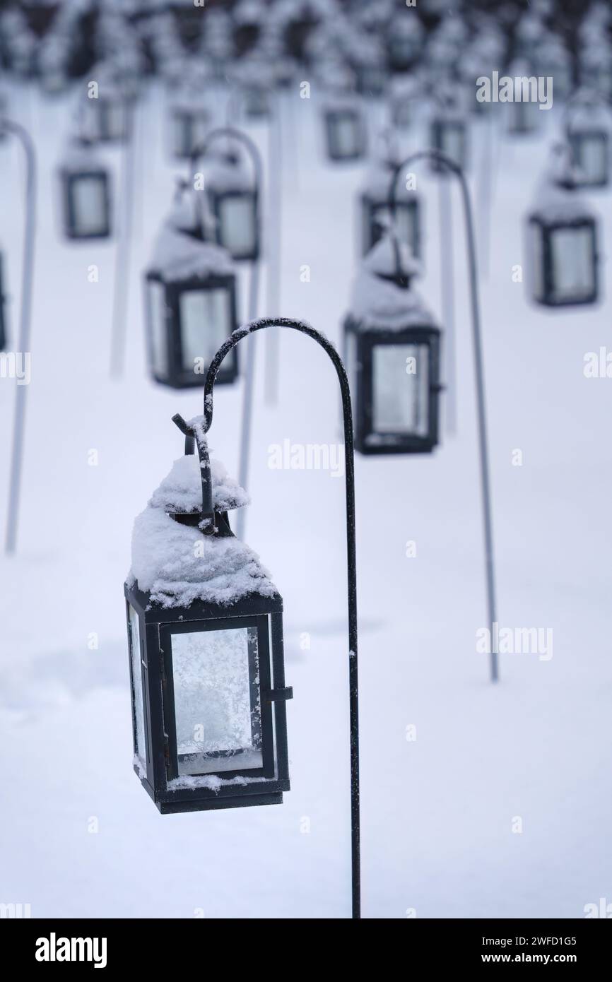 Group of empty lanterns in a cemetery in winter. Close up Stock Photo