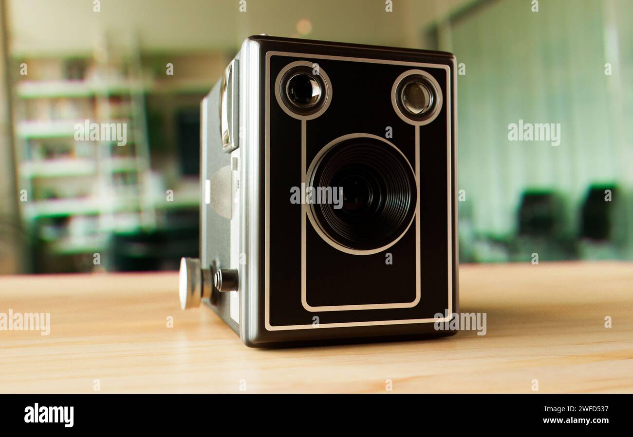 A vintage analogue box camera on a wooden surface background - 3D ...
