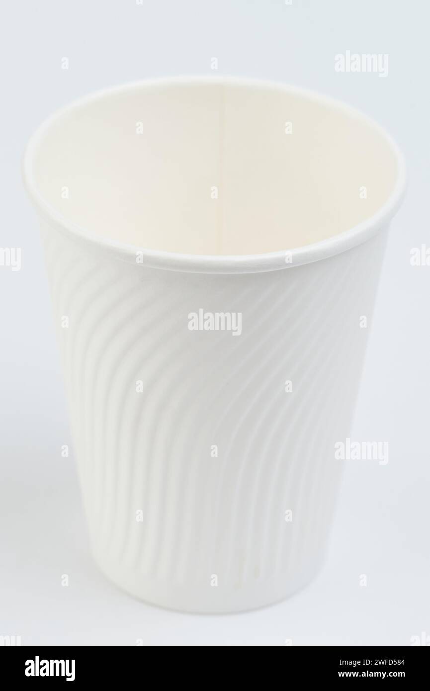 White paper cup perspective view isolated on white studio background ...