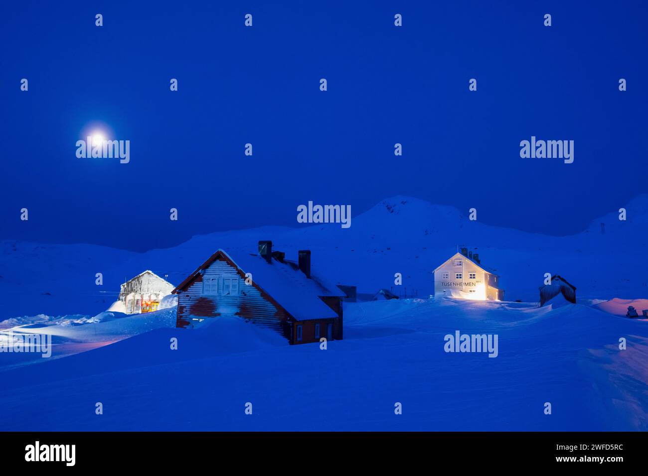 Finse, Norway -- snowdrifts and moonset on a cold winter morning Stock Photo