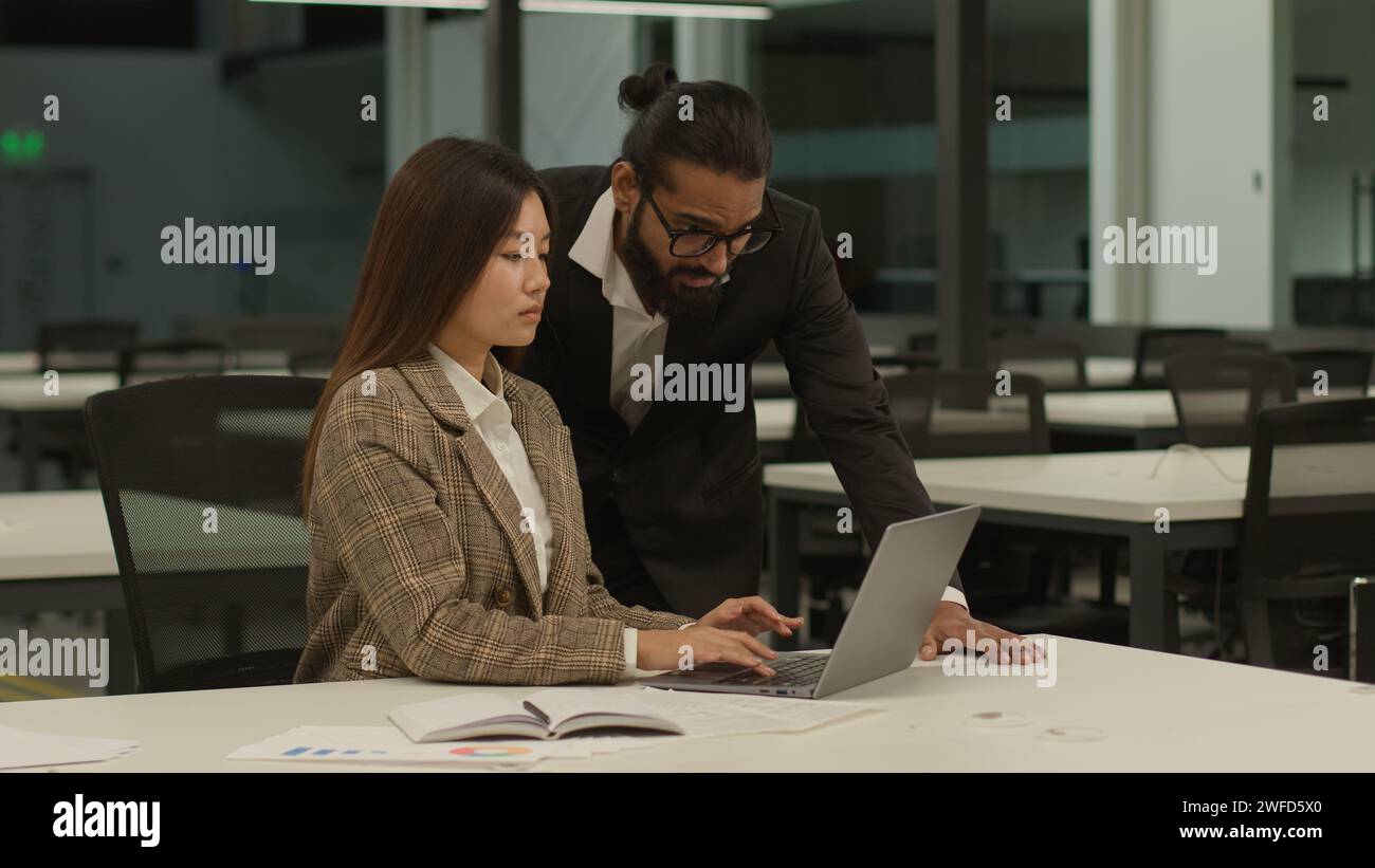 Diverse female colleagues typing hi-res stock photography and images ...