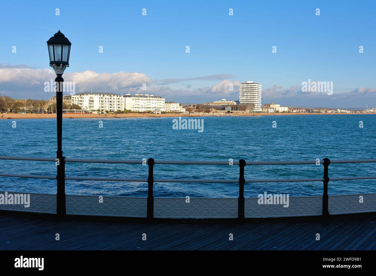 The seafront at Worthing as viewed from the pier on a sunny and cold winter's day West Sussex England UK Stock Photo
