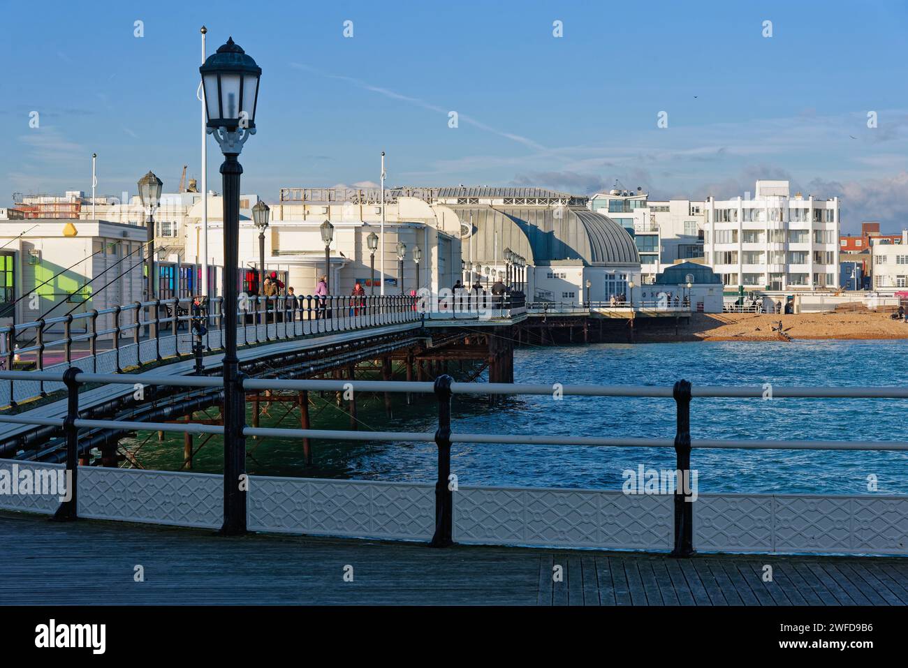 The seafront at Worthing as viewed from the pier on a sunny and cold winter's day West Sussex England UK Stock Photo