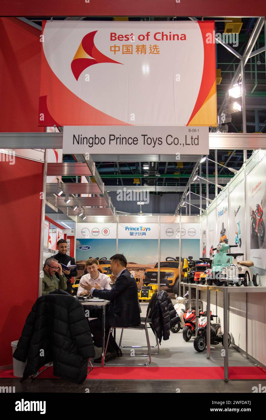 Nuremberg, Germany. 30th Jan, 2024. A Chinese exhibitor talks with visitors at the Nuremberg