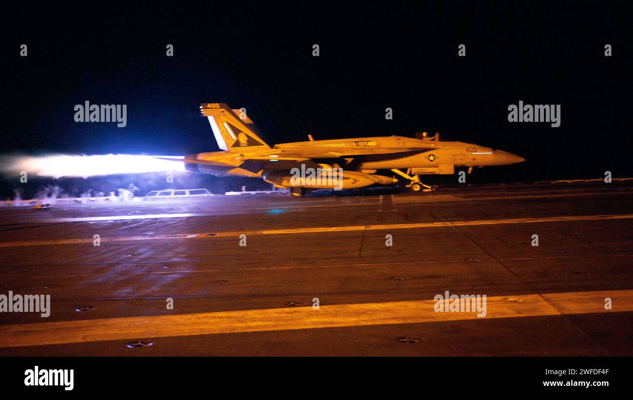 Red Sea, United States. 12 January, 2024. A U.S. Navy F/A-18F Super Hornet fighter jet, performs a night-time launch off the flight deck of the Nimitz-class aircraft carrier USS Dwight D. Eisenhower to perform a combat sortie against the Iranian-backed Houthi, January 12, 2022 in the Red Sea. The Eisenhower aircraft are in support of Operation Prosperity Guardian to prevent attacks on commercial shipping in the region.  Credit: MC2 Zachary Elmore/U.S. Navy Photo/Alamy Live News Stock Photo