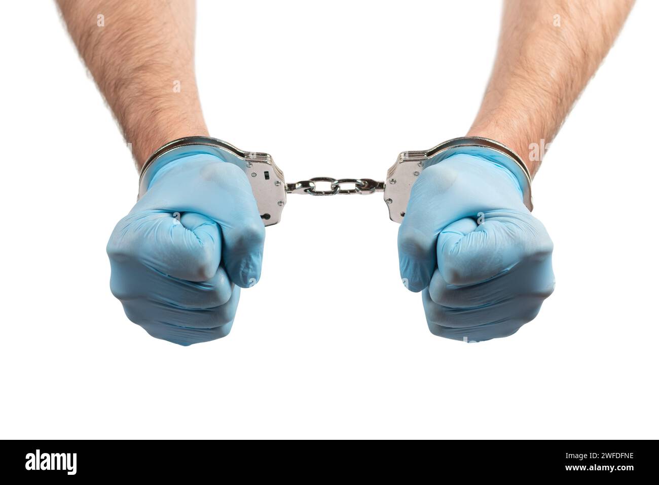 male hands in handcuffs and medical glove on white background, concept of medical corruption, bribery, crime Stock Photo