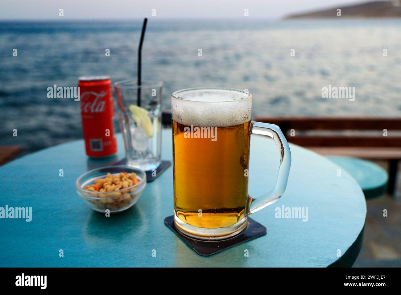 Beer, Coke and nuts, Tilos, Greece. Stock Photo