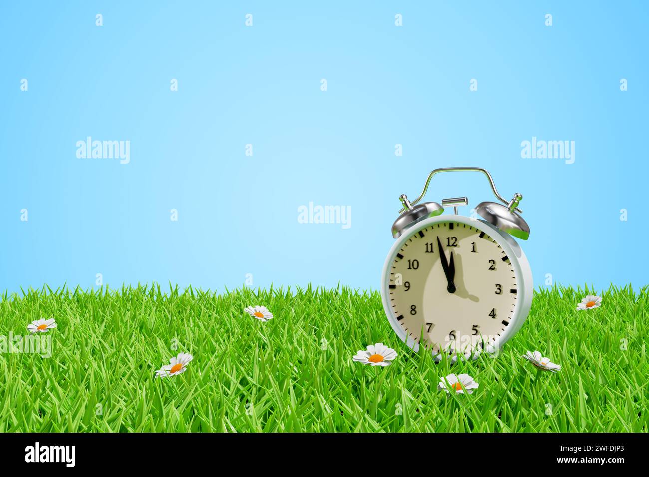 Alarm clock on a meadow in the grass. Daylight saving transitional change of season. 3d rendering Stock Photo