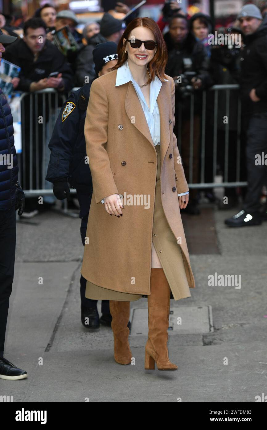 Emma Stone leaves Good Morning America studios on January 30, 2024 in