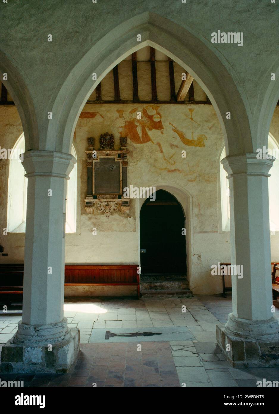 Remains of a C15th (c 1480) St Christopher wall painting in the S aisle of Albury Park church, Surrey, England, UK: head & shoulders of St Christopher Stock Photo