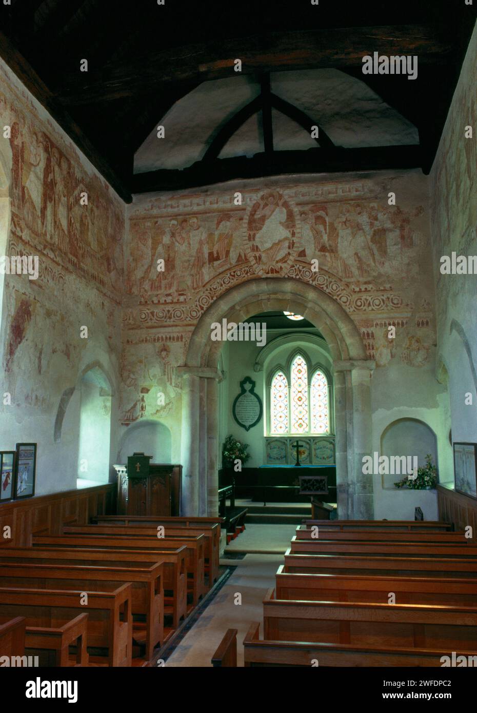 C12th Last Judgement frescoes around the walls & chancel arch of the C11th Saxon nave of St John the Baptist's Church, Clayton, Sussex, England, UK Stock Photo