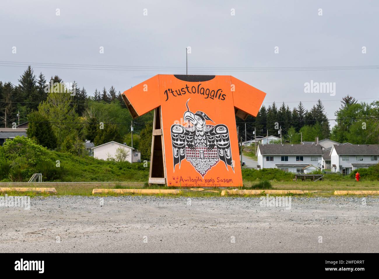 A large public art cut-out of an orange shirt memorializes the loss of indigenous children in Canadian residential schools, in the community of Yalis Stock Photo