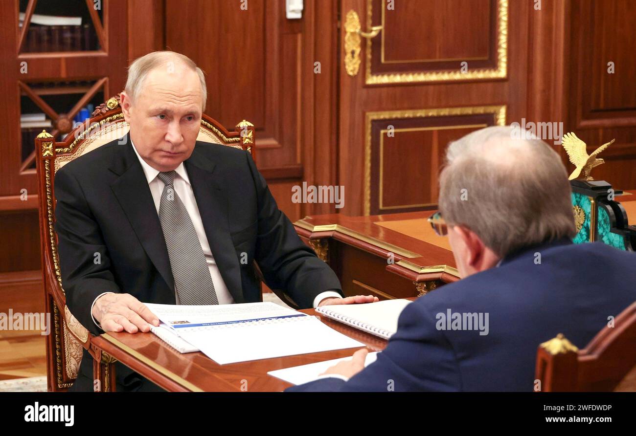 Moscow, Russia. 30th Jan, 2024. Russian President Vladimir Putin, left, listens to Russian Academy of Sciences President Gennady Krasnikov during a face-to-face meeting at the Kremlin, January 30, 2024 in Moscow, Russia. Credit: Gavriil Grigorov/Kremlin Pool/Alamy Live News Stock Photo