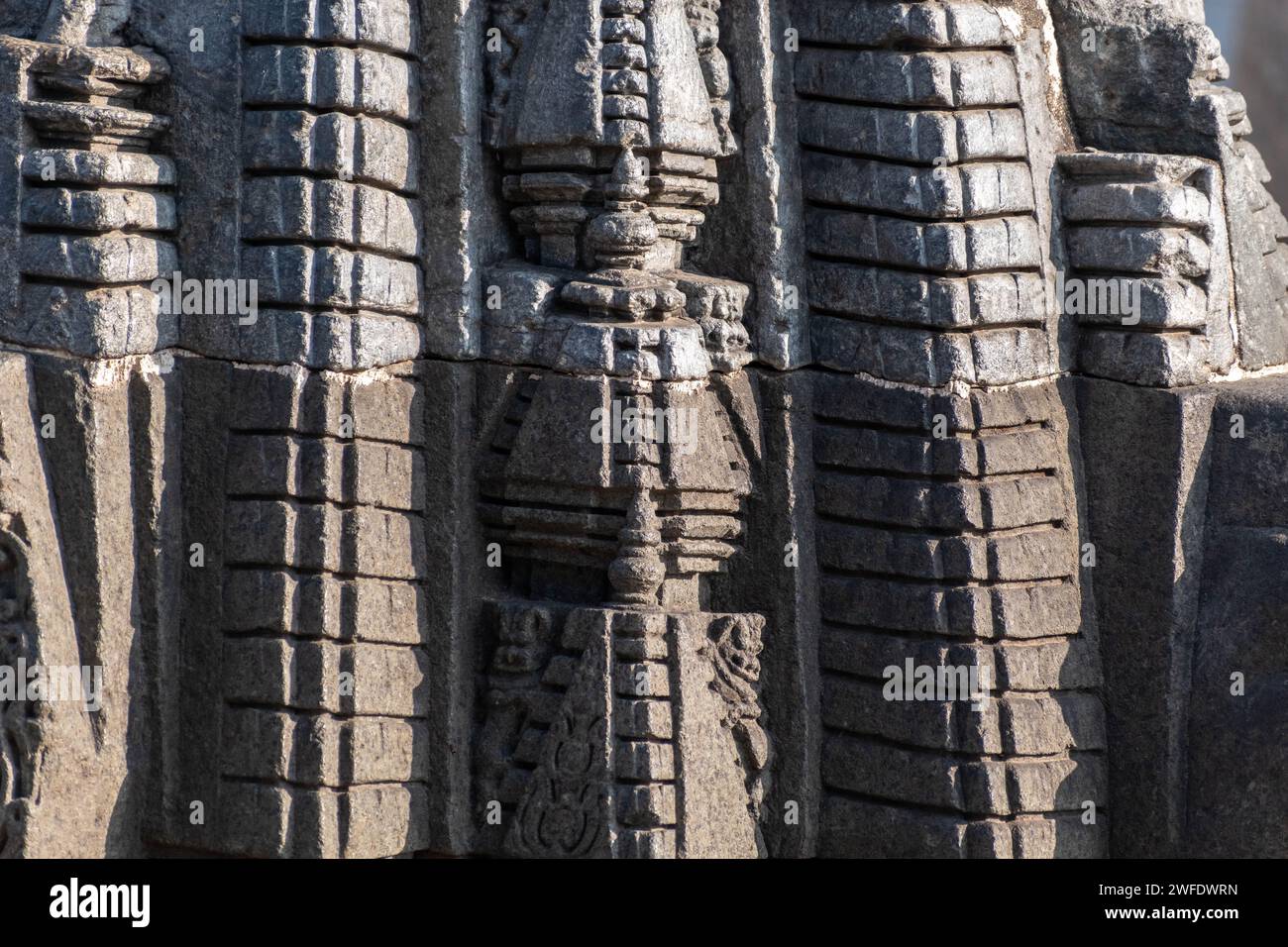 Abstract detail of the architectural patterns on the spire of a Hindu temple in the Chennakeshava complex in Belur, Karnataka. Stock Photo