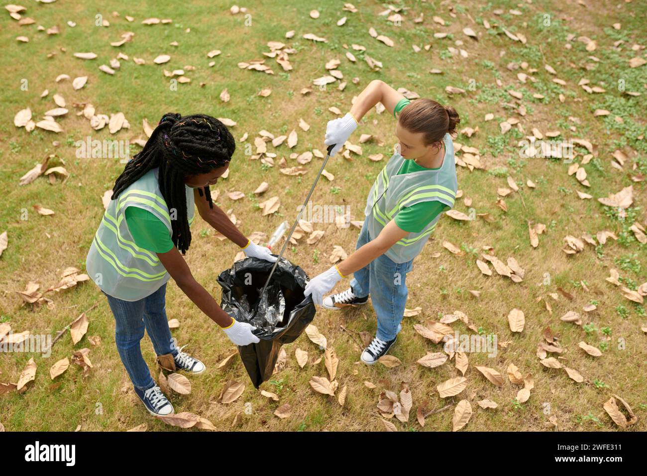 Collecting waste garbage bag hi-res stock photography and images - Alamy