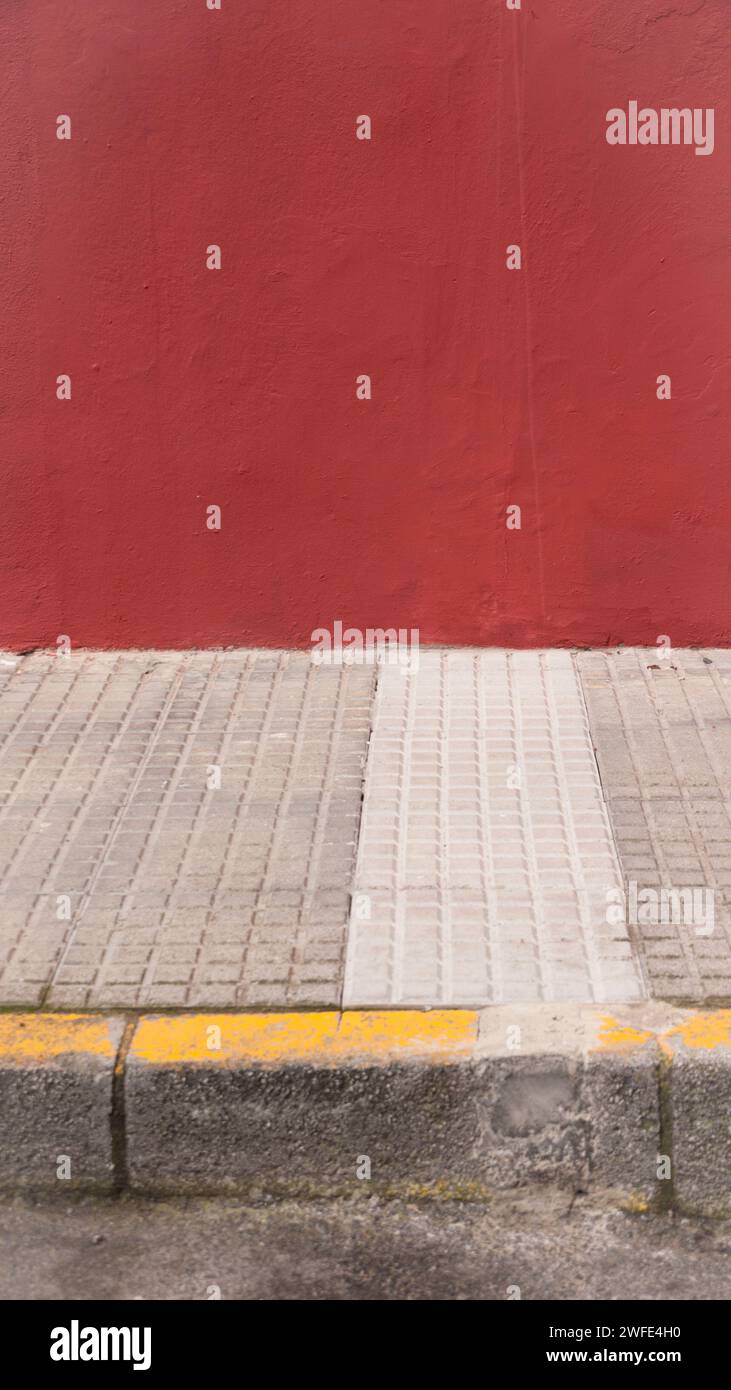 REd paint wall and pavement Stock Photo Alamy
