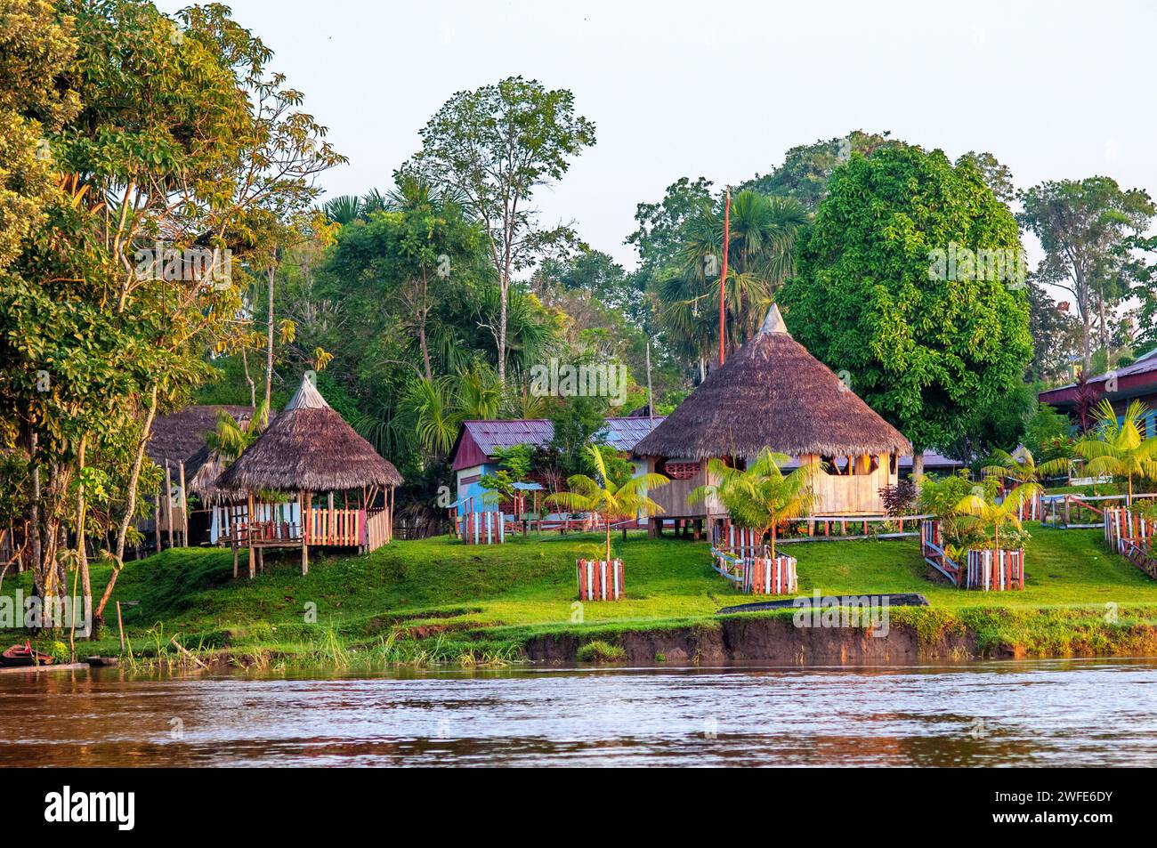 Wooden houses in the indiana village near Iquitos, Loreto, Peru, South America.  The department of Loreto, the largest in Peru, was inhabited since an Stock Photo