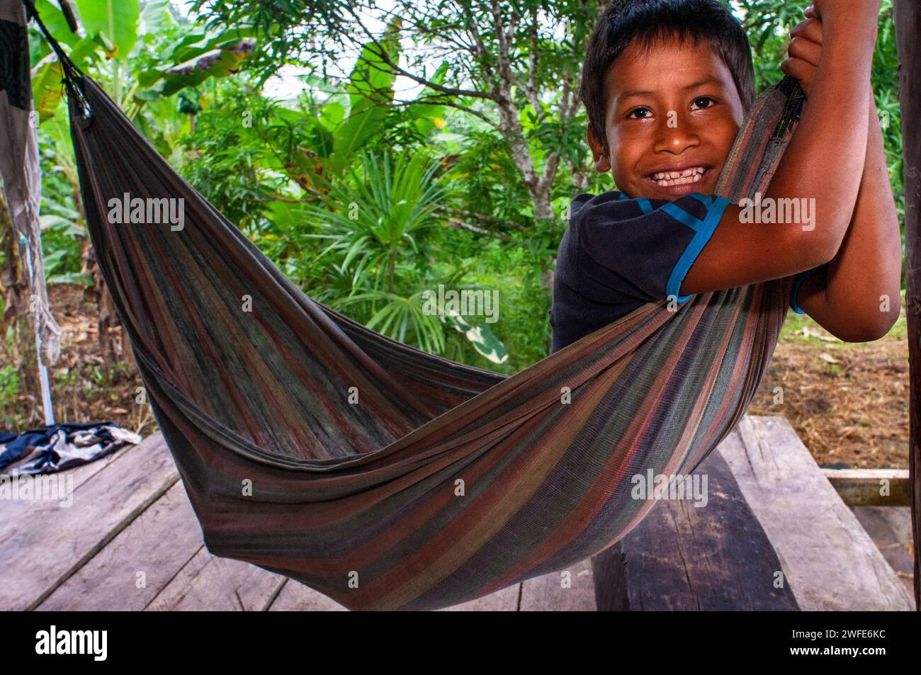 Boy of the riverside village of Timicuro I. Iqutios peruvian amazon, Loreto, Peru Stock Photo