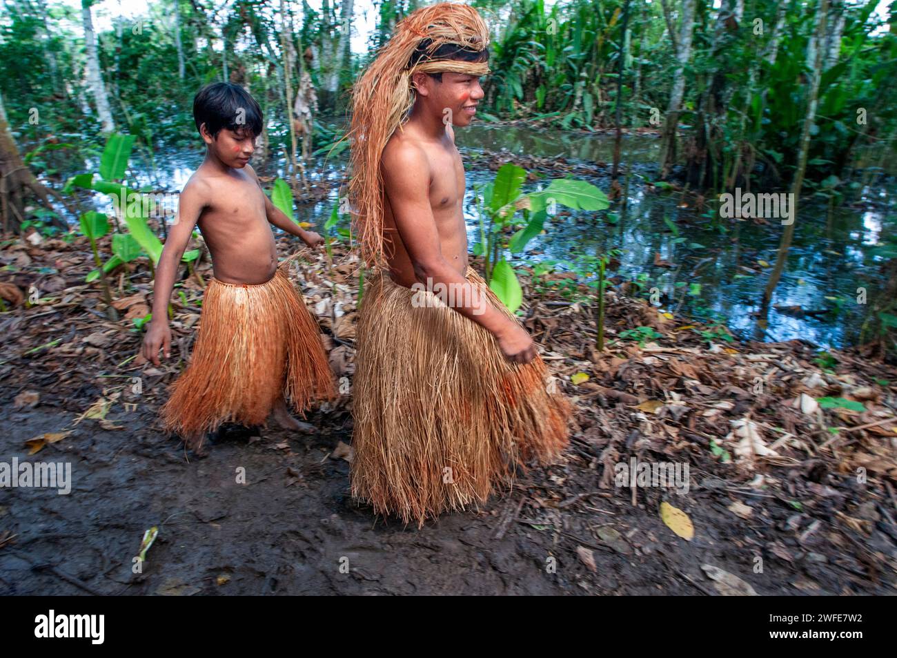 Teenagers Yagua Indians Living A Traditional Life Near The Amazonian