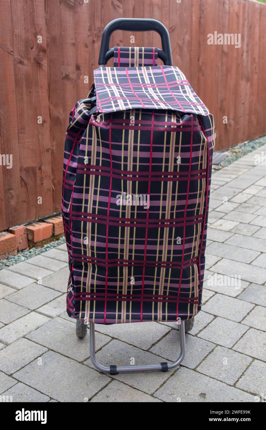 Wheeled Pull Along Upright Tartan Shopping Trolley Stock Photo Alamy