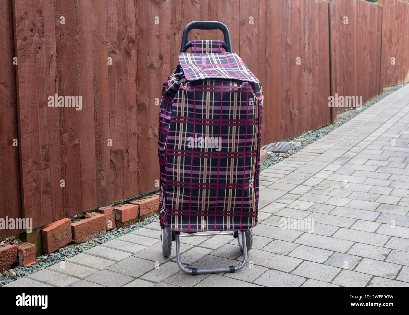Wheeled Pull Along Upright Tartan Shopping Trolley Stock Photo Alamy