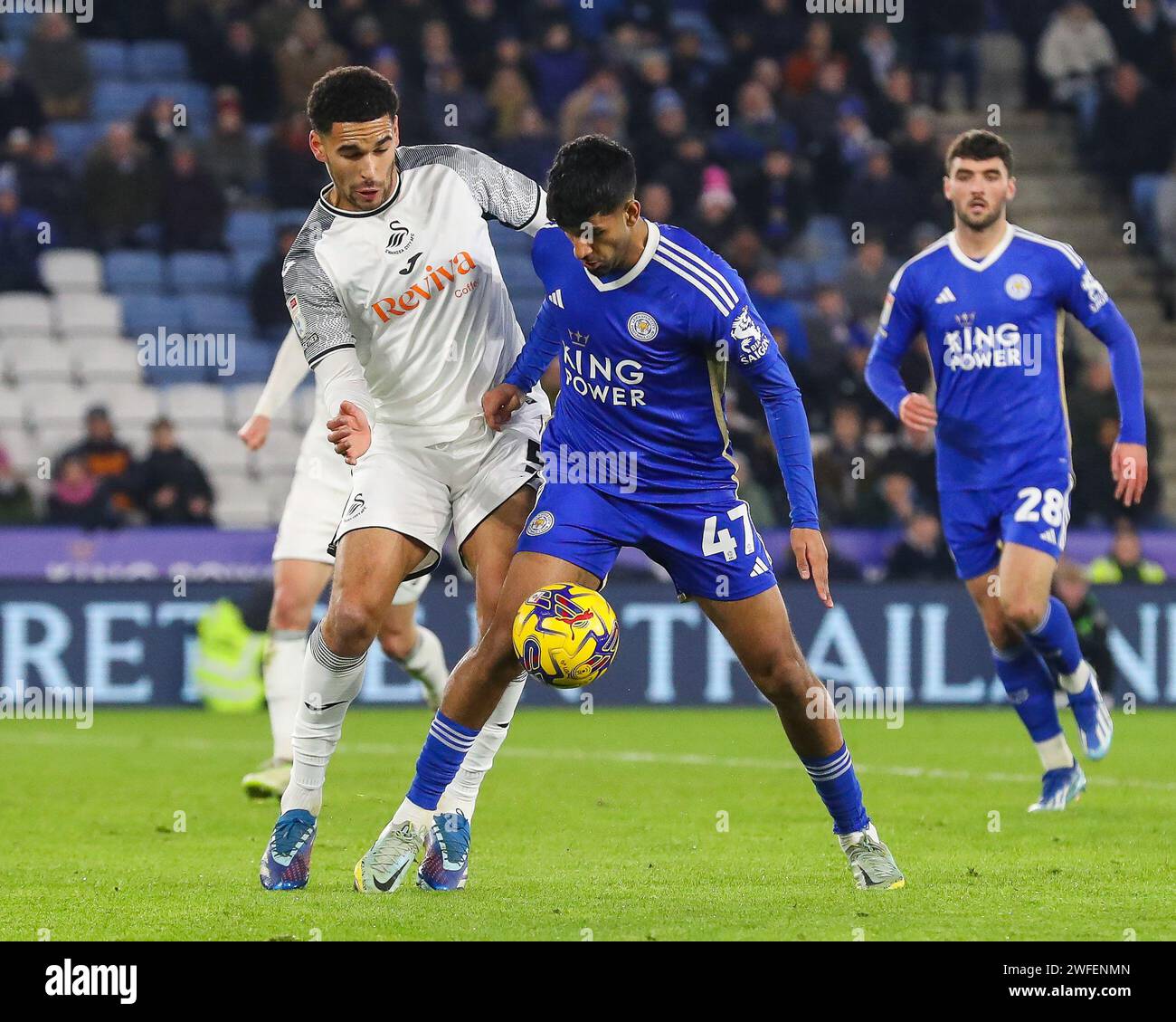 Ben Cabango of Swansea City and Arjan Raikhy of  Leicester City battle for the ball during the Sky Bet Championship match Leicester City vs Swansea City at King Power Stadium, Leicester, United Kingdom, 30th January 2024  (Photo by Gareth Evans/News Images) Stock Photo