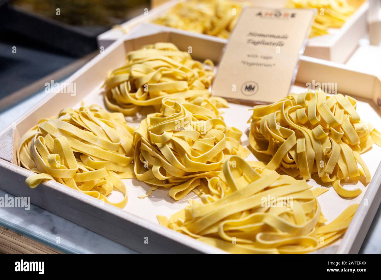 Frash tagliatelle pasta at Dez Amore Pasta, Mercato Metropolitano Woof Wharf, London, England Stock Photo