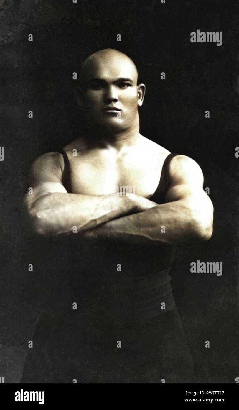 Archival photograph of a strong or muscle man, circa 1910. Stock Photo