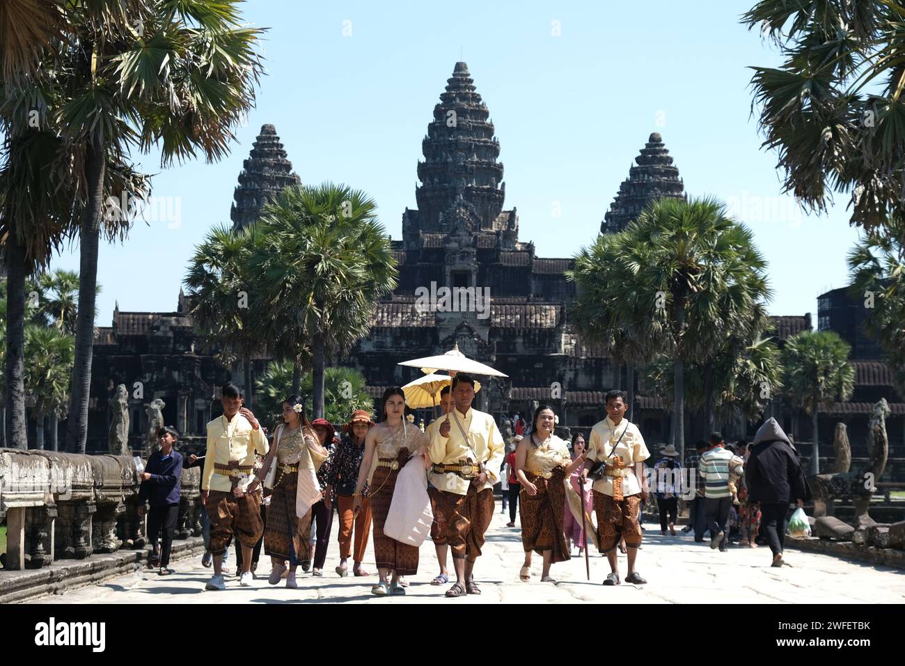 Cambodian tourists in traditional costume visit Angkor Wat, a Unesco world heritage site, near Siem Reap, Cambodia Stock Photo