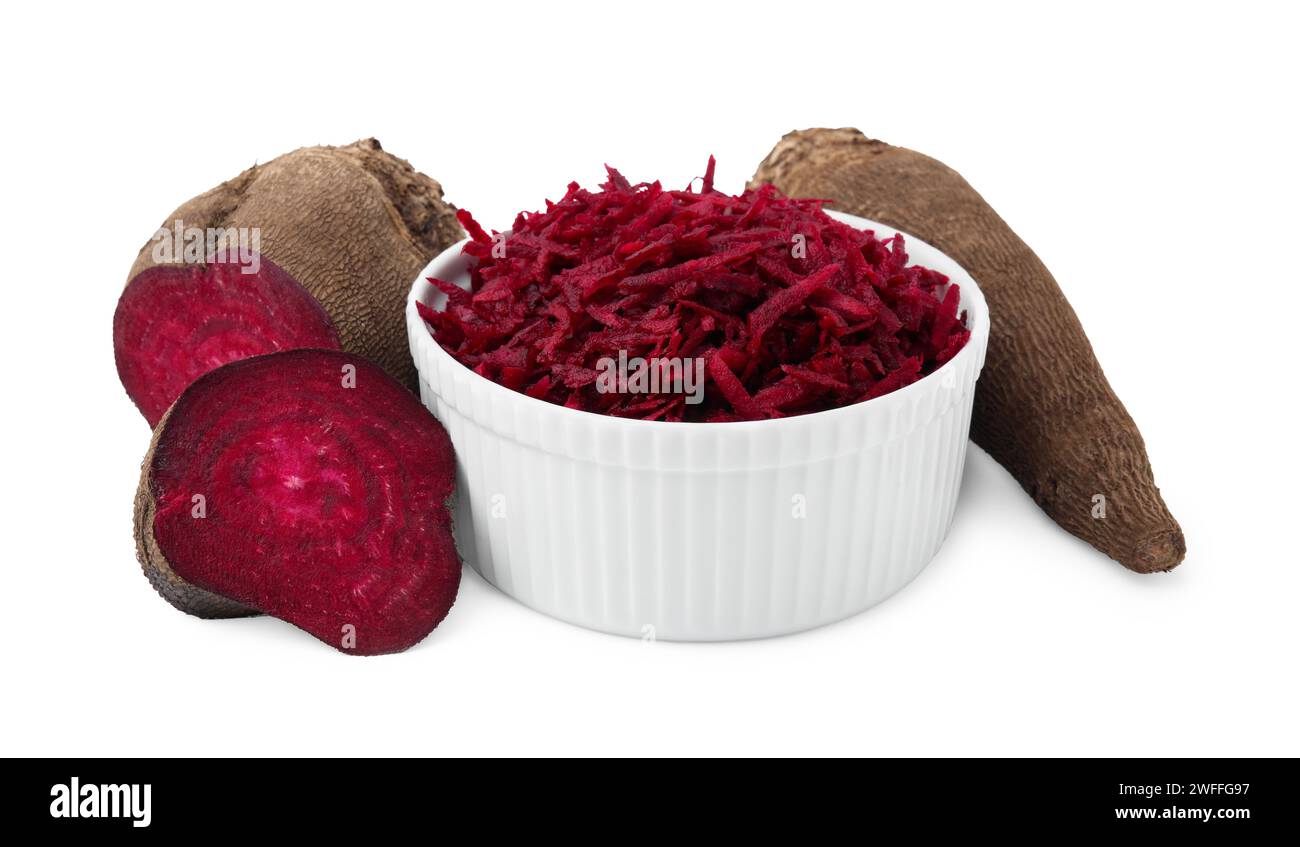 Whole, cut and grated red beets in bowl isolated on white Stock Photo