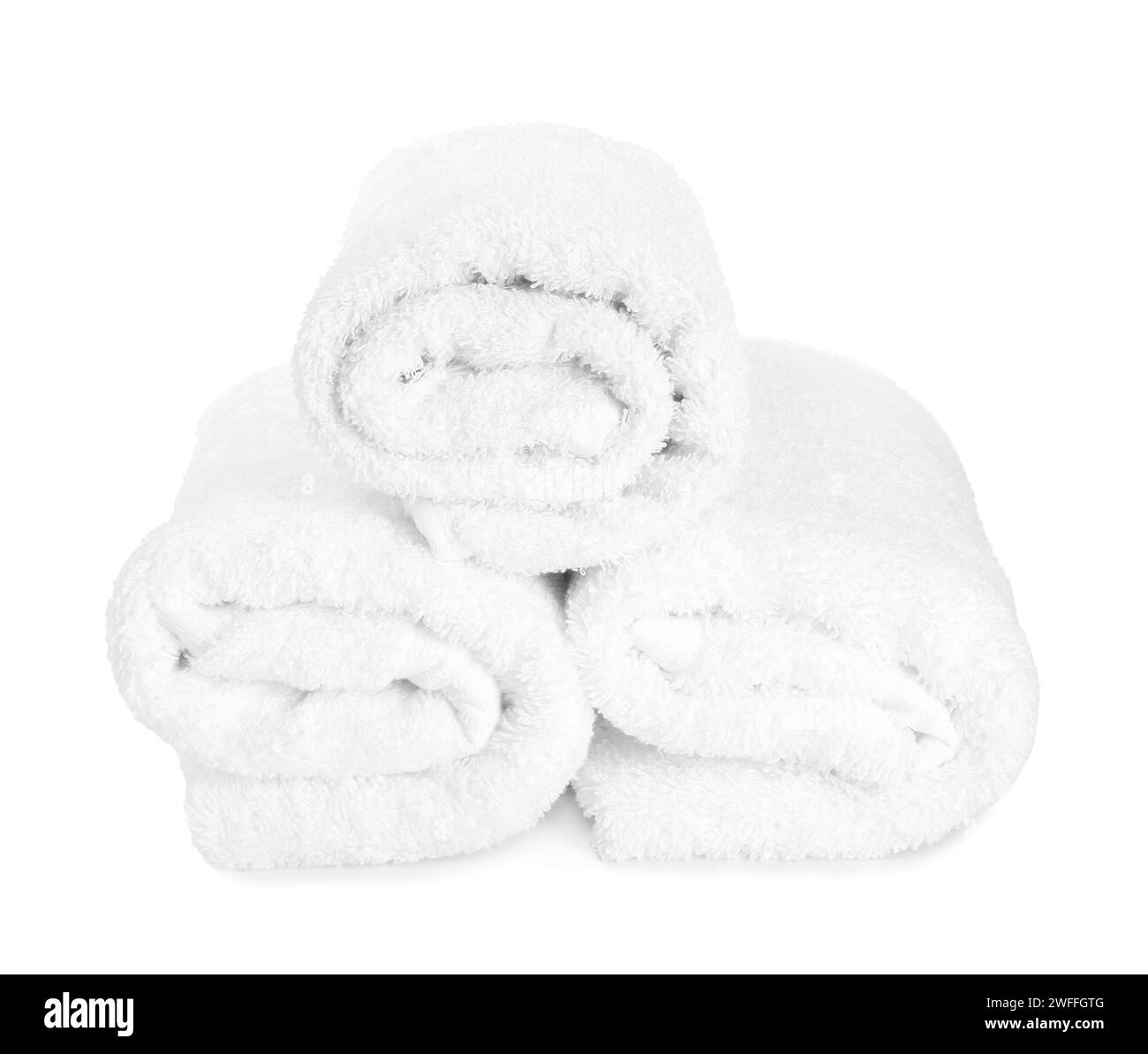 Three rolled terry towels isolated on white Stock Photo
