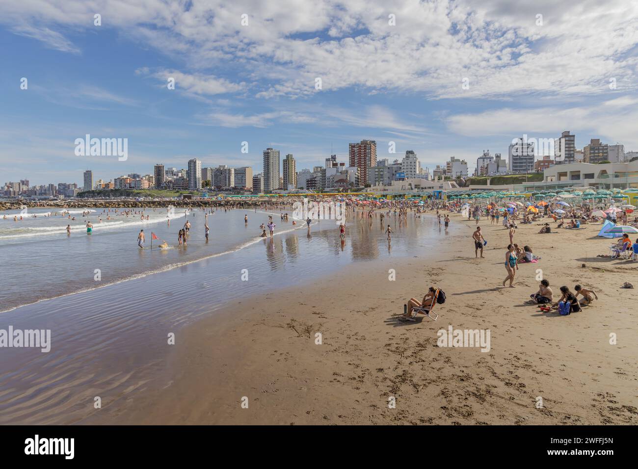 Mar del Plata, Argentina - January 15th, 2024: Tourists resting at Stella Maris beach in Mar del Plata. Stock Photo
