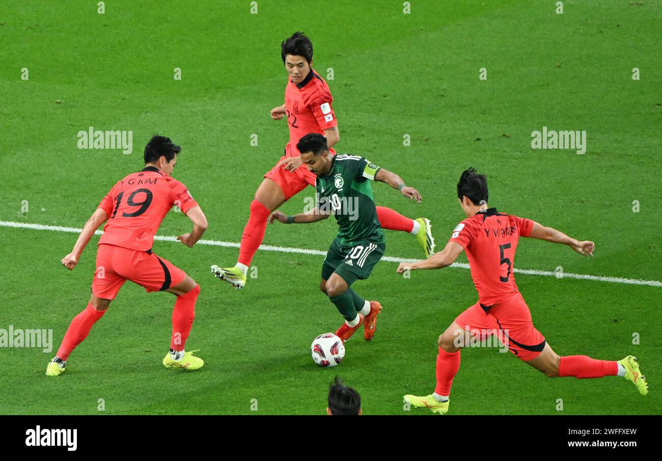 Doha, Qatar. 30th Jan, 2024. Saudi Arabia's Salem Aldawsari (2nd R) is defended by South Korea's players Kim Young-Gwon (1st L), Park Yong-Woo (1st R) and Seol Young-Woo during the round of 16 match between Saudi Arabia and South Korea at AFC Asian Cup Qatar 2023 in Doha, Qatar, Jan. 30, 2024. Credit: Sun Fanyue/Xinhua/Alamy Live News Stock Photo