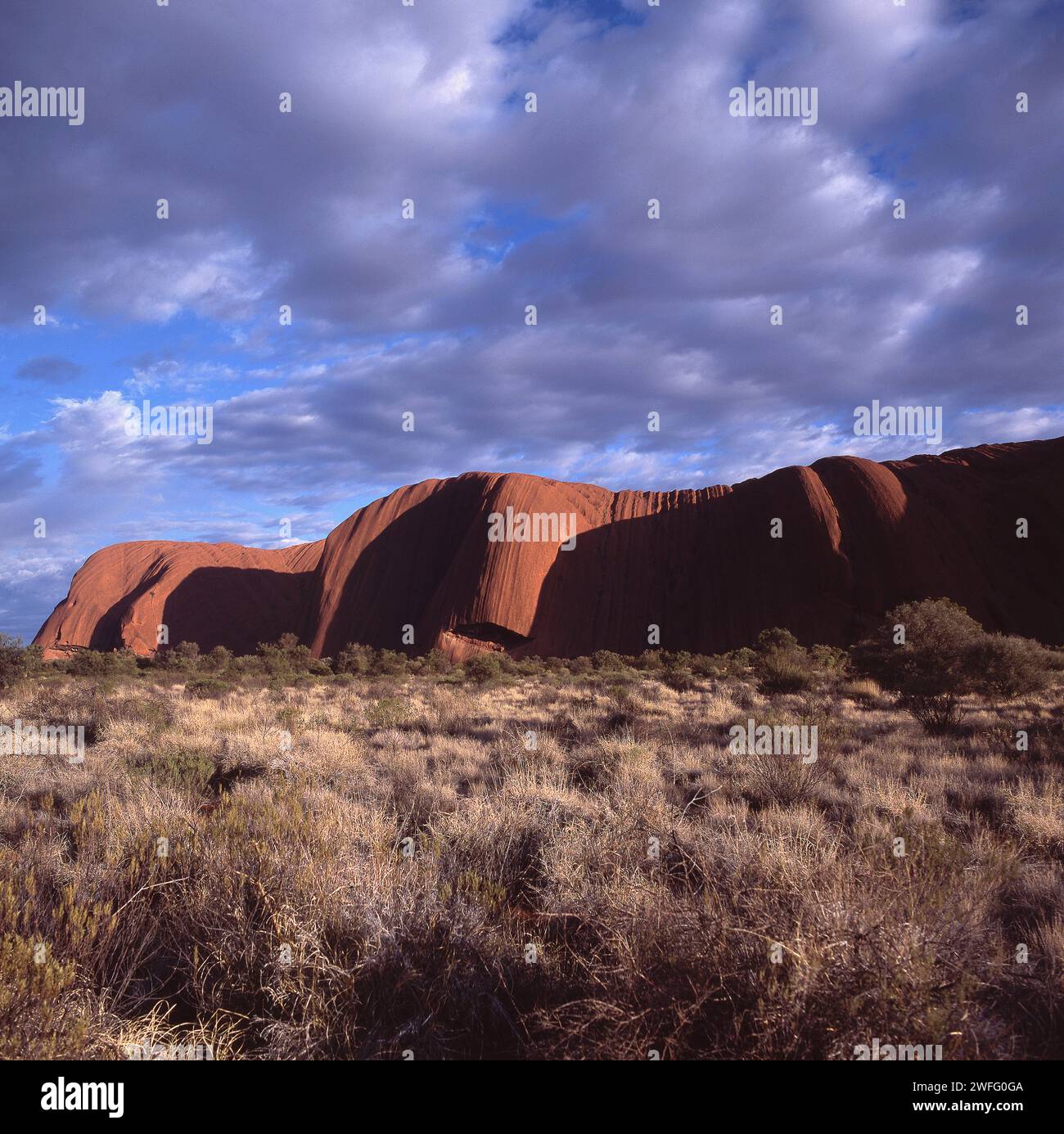 AYERS ROCK (ULURU) IS A LARGE SANDSTONE FORMATION IN CENTRAL AUSTRALIS ...