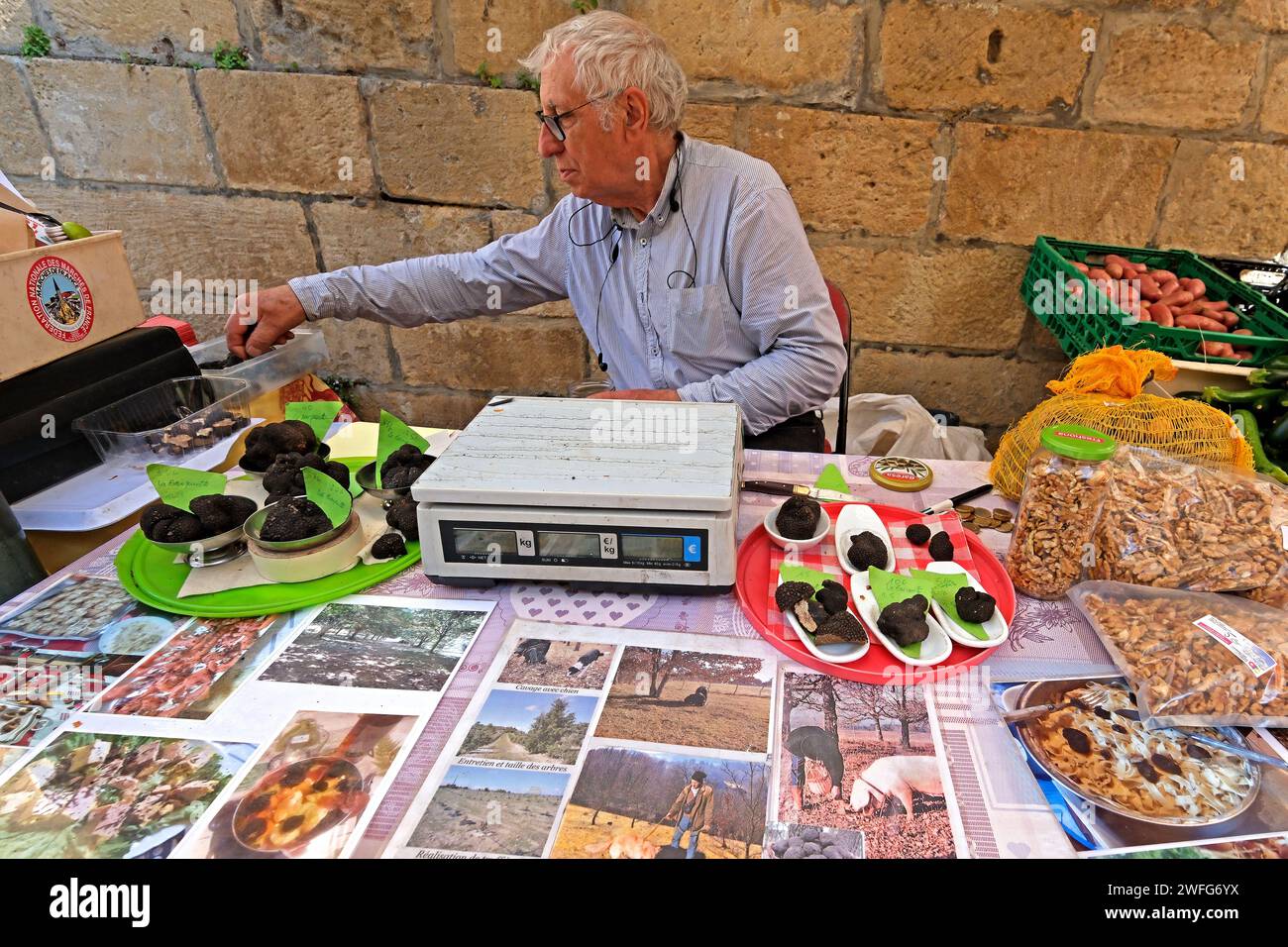 Stall at the Saturday market selling various local truffle in Sarlat France Stock Photo