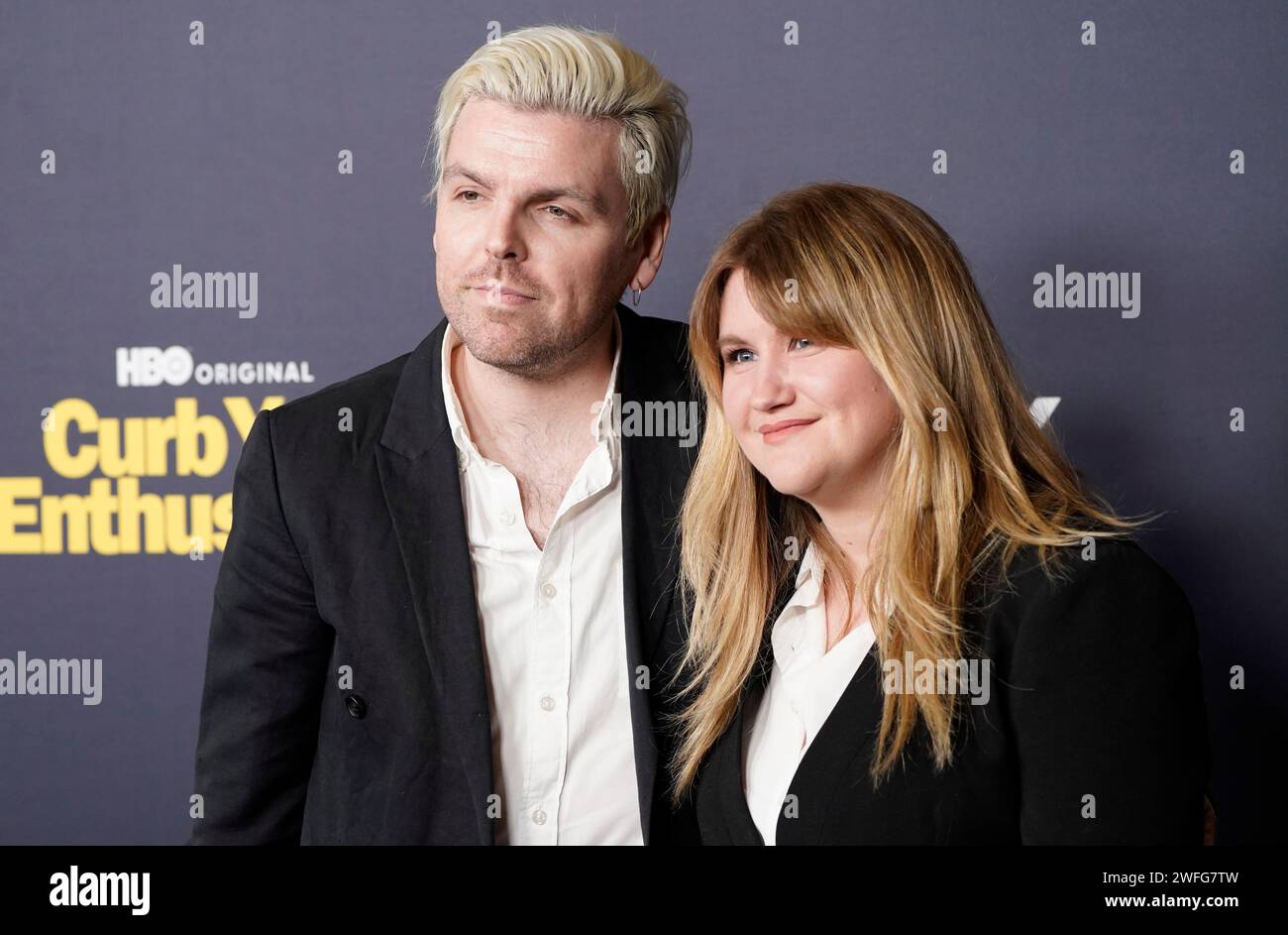 Luke McGarry, left, and Jillian Bell arrives at the 