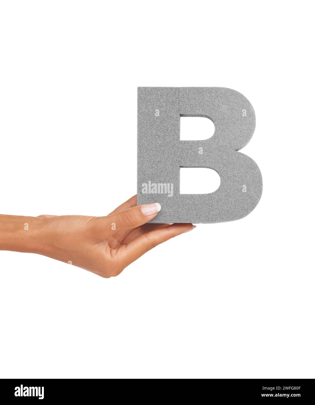 Hand of woman, capital letter B and presentation of consonant isolated on white background. Character, font and palm with English alphabet typeface Stock Photo