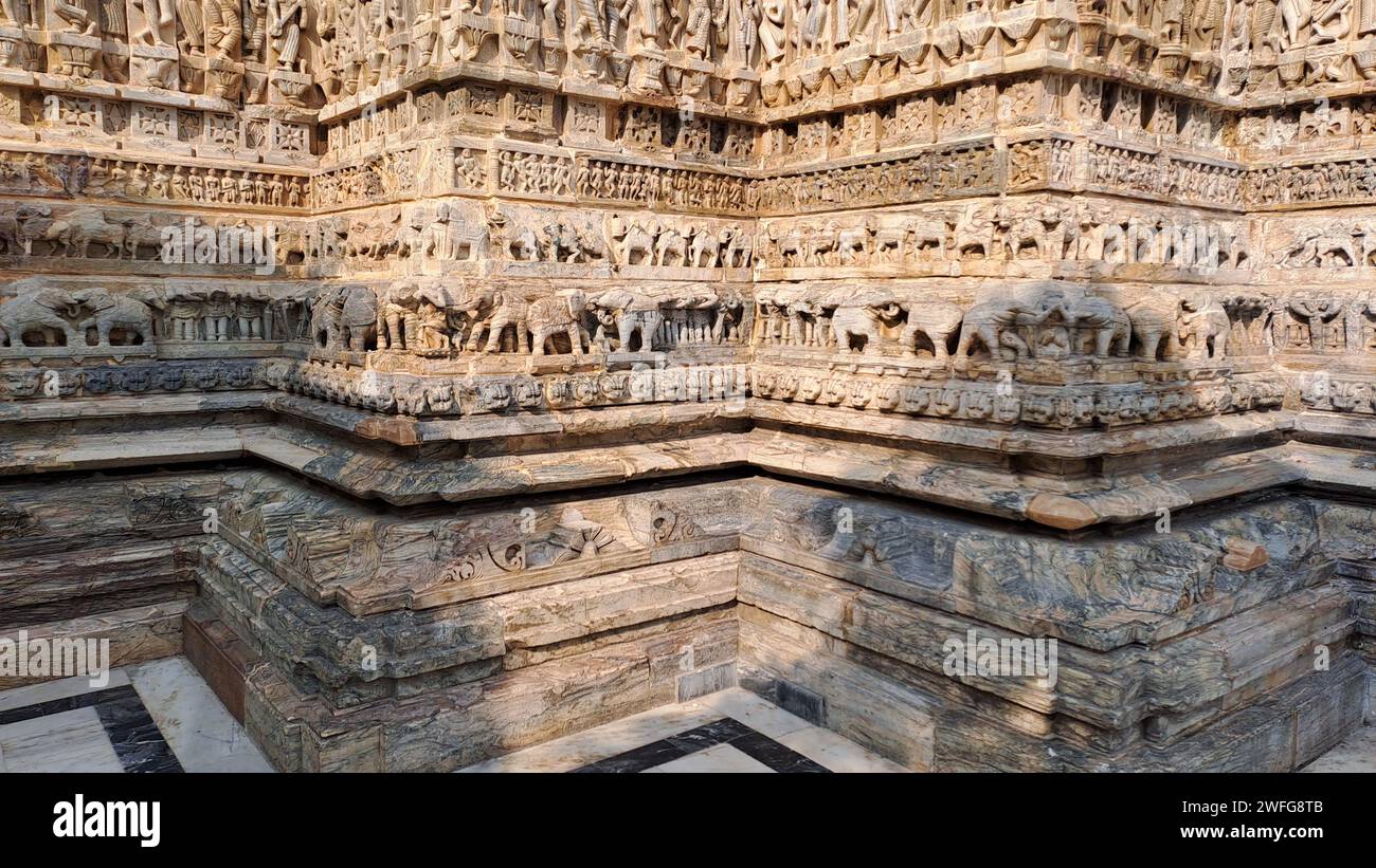 Stone Carvings on the wall of Jagdish Temple in Udaipur, Rajasthan, India Stock Photo