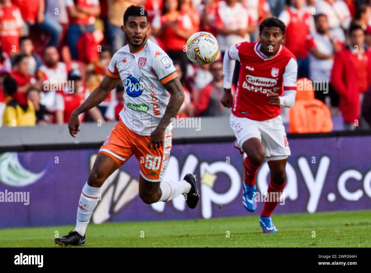 Bogota, Colombia. 27th Jan, 2024. Envigado's FC Santiago Norena (L) and Independiente Santa Fe's Jhon Wenceslao Melendez (R) during the BetPlay Dimayor league match between Independiente Santa Fe (3) vs Envigado FC (1) on January 27, 2024, in Bogota, Colombia. Photo by: Cristian Bayona/Long Visual Press Credit: Long Visual Press/Alamy Live News Stock Photo