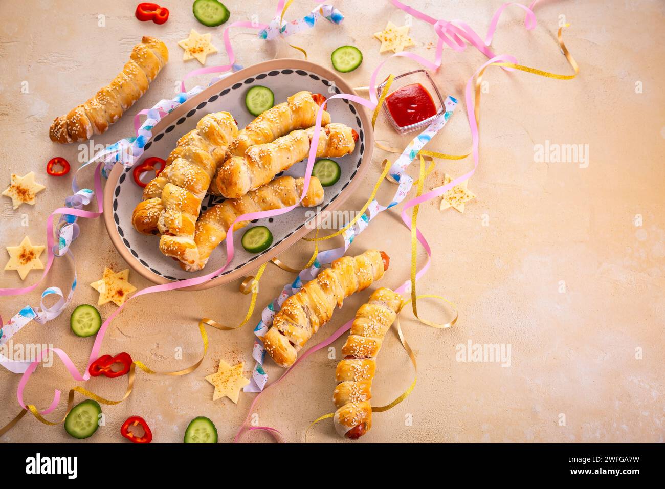 Pig in blanket, long sausages wrapped in yeast dough traditional