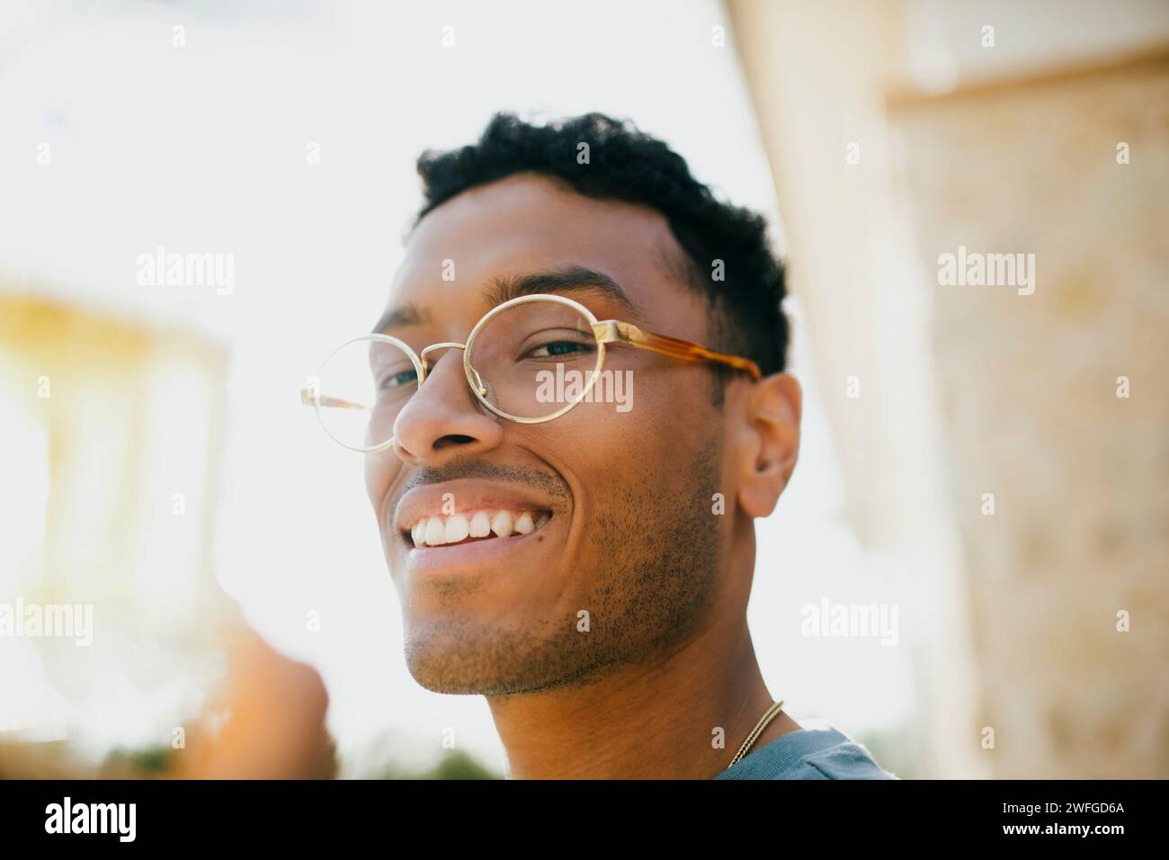 Portrait of smiling man wearing eyeglasses Stock Photo