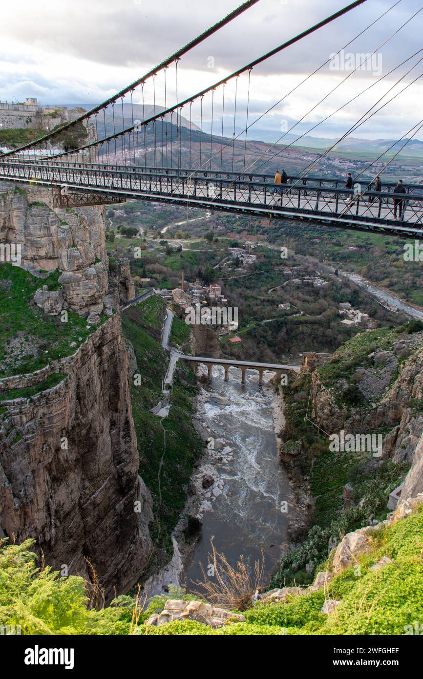 High-angle view of Sidi M'Cid Bridge the suspension bridge across the ...