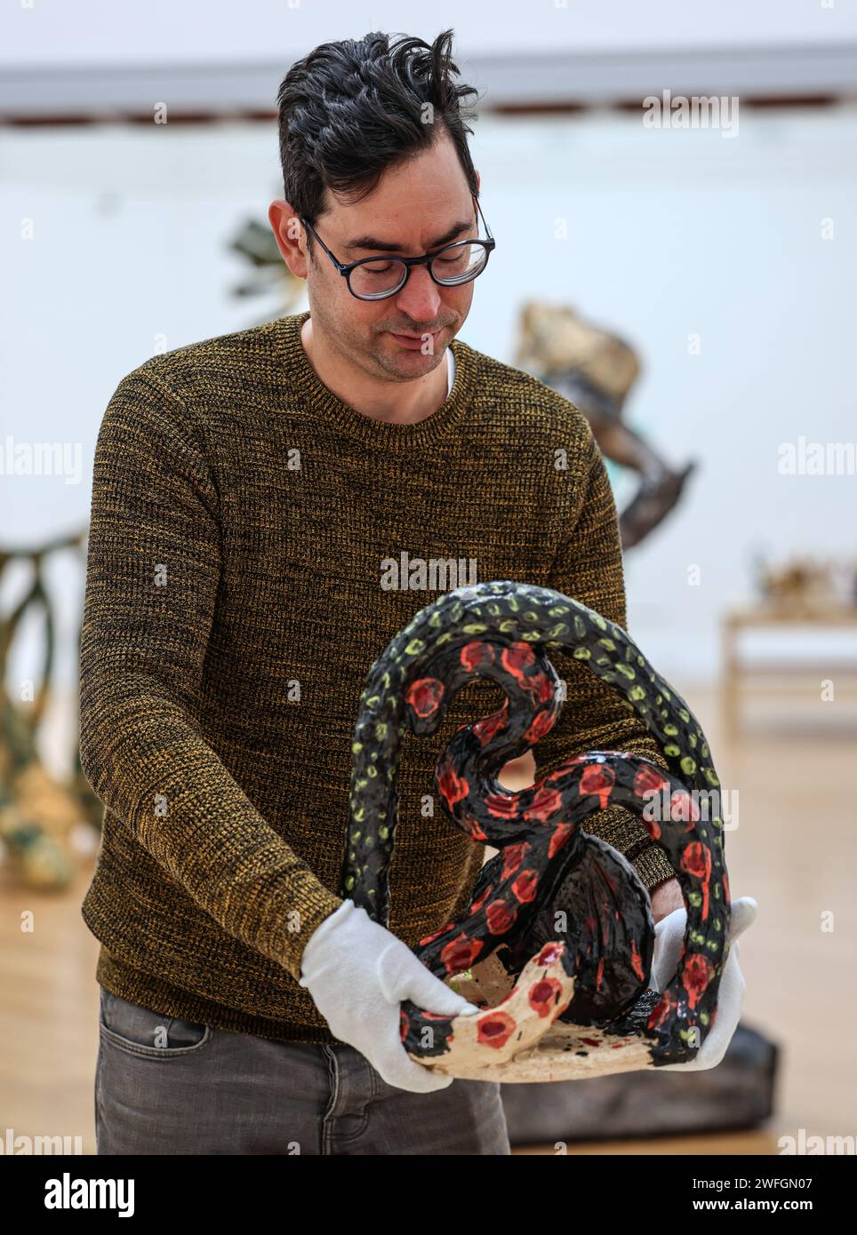 Bristol, England 31 January 2024 A Gallery assistant with ,Lamia 1994