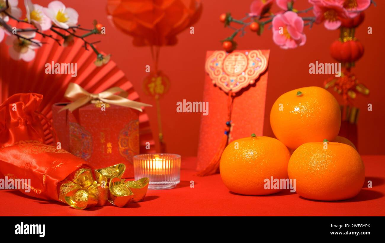 Chinese Lunar New Year red background. ancient Chinese gold bar in silk