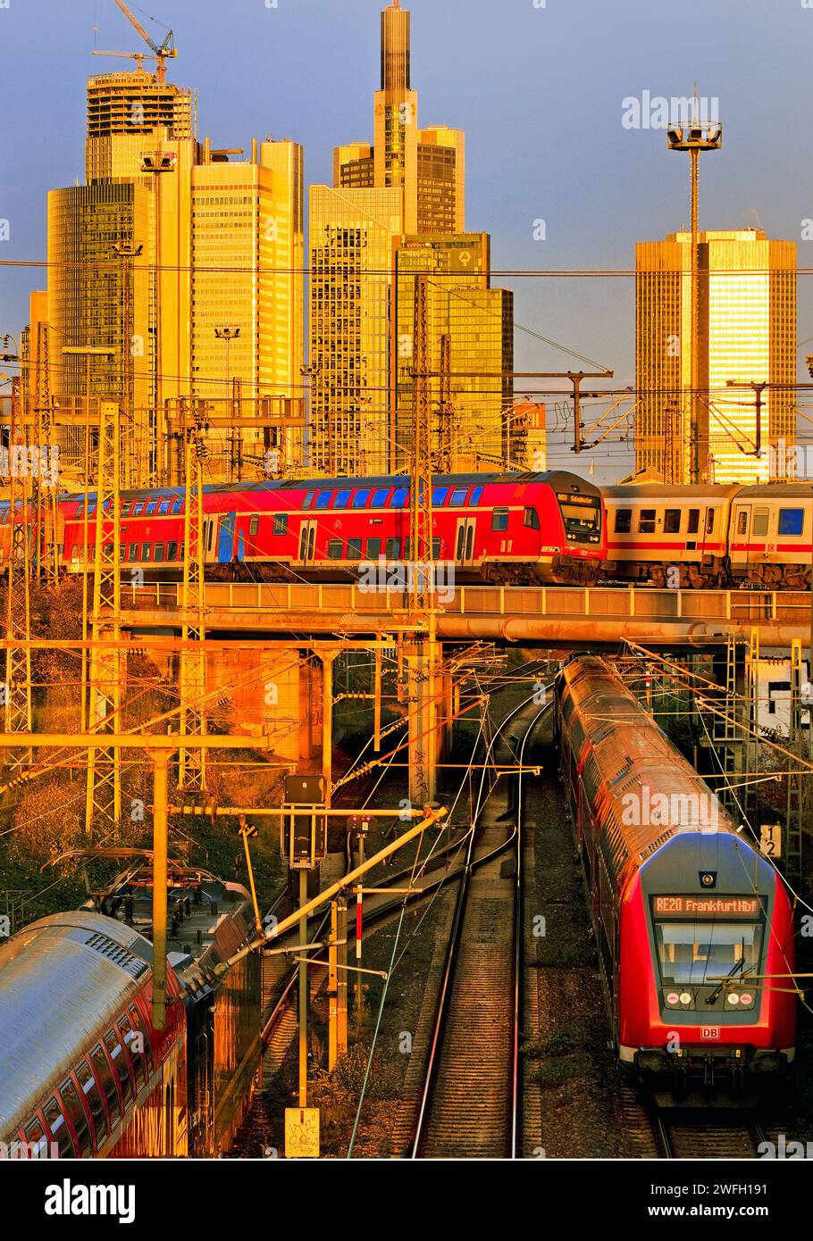 several trains at central station and high-rise buildings, Germany, Hesse, Frankfurt am Main Stock Photo