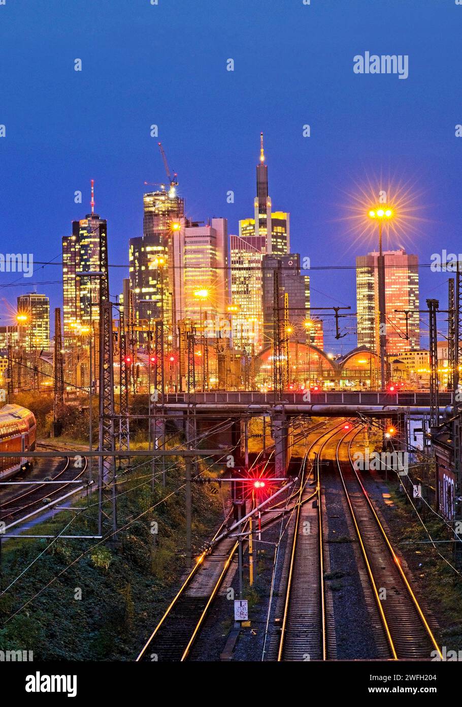 several trains at central station and high-rise buildings, Germany, Hesse, Frankfurt am Main Stock Photo