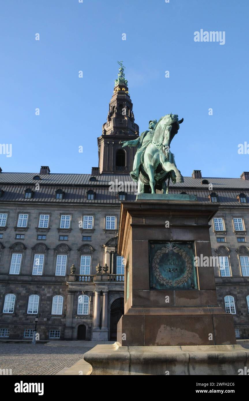 Copenhagen, Denmark /31 January 2023/ Christiansborg castle or christiasnborg slot part of danish parliament folketinget and the statute of King Frederik the 7th gave danish consitution on 5 june 1894 andkind on horse back infron of castle in danish capital in danish capital. Photo.Francis Joseph Dean/Dean Pictures Stock Photo